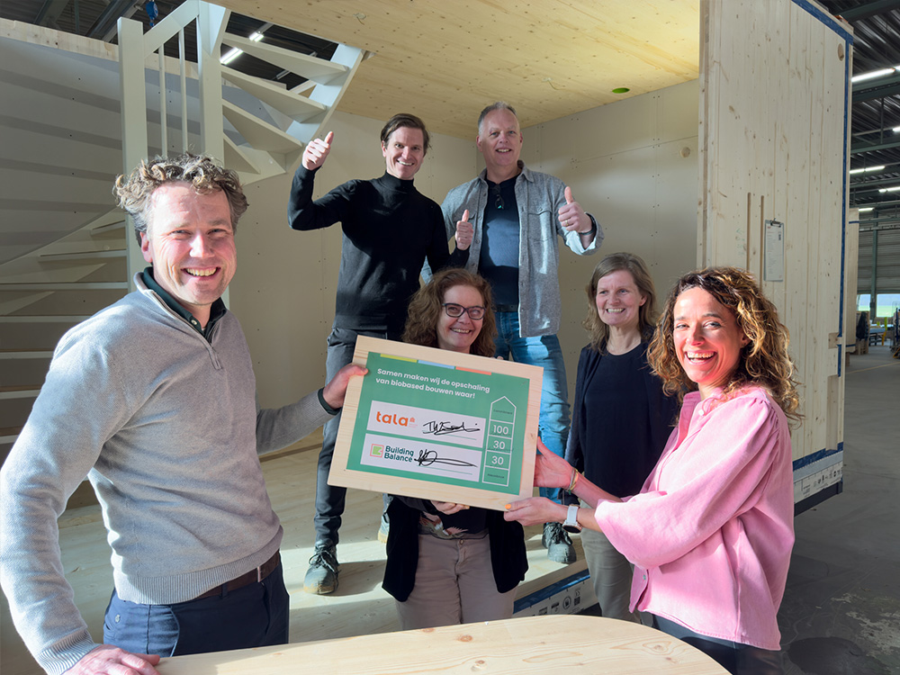 Tala tekent commitmentverklaring met Building Balance